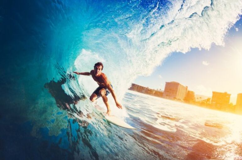 depositphotos_91482628-stock-photo-surfer-on-blue-ocean-wave